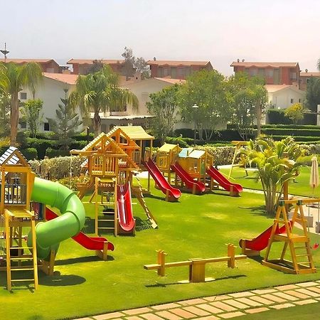 小威尼斯高尔夫杰斯酒店&度假村 艾因苏赫纳 外观 照片 Playground in El Alamein